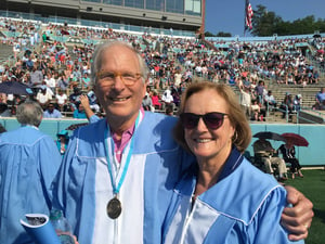 Rob and Susan in UNC graduation gowns